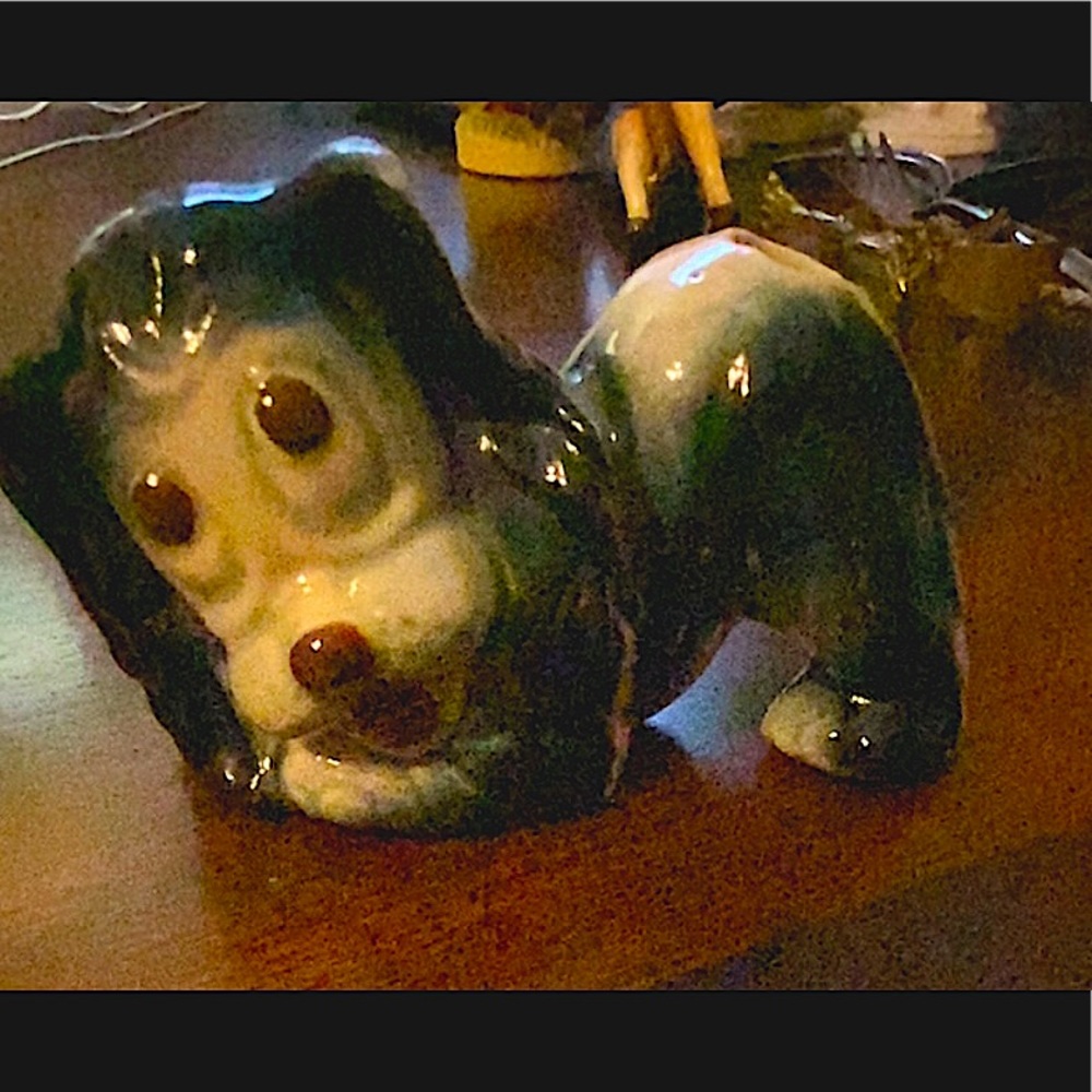 Vintage ceramic dog used as a plant holder from the 1950s